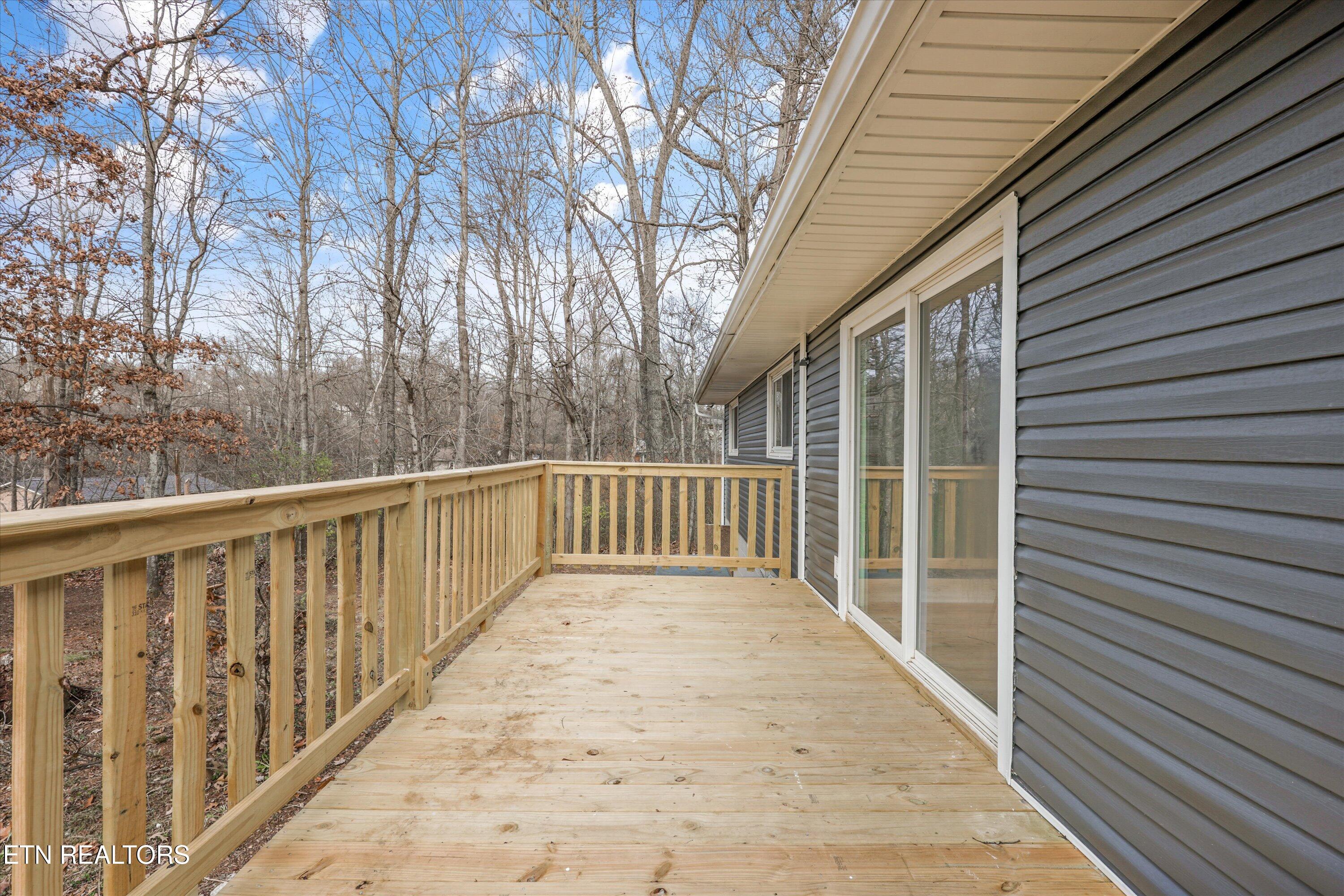 5817 Stoneleigh Road Knoxville, TN 37912 - Photo 22 of 29 Large Rear Deck Overlooking Trees