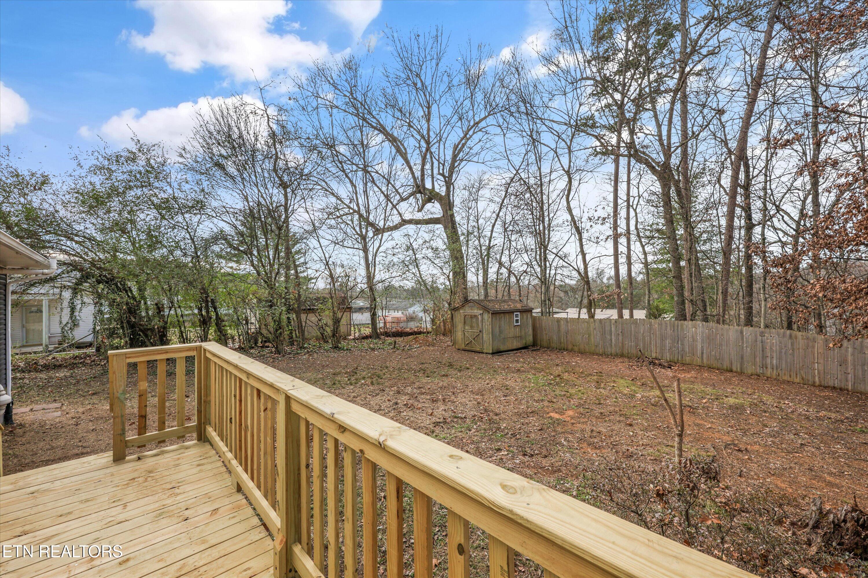 5817 Stoneleigh Road Knoxville, TN 37912 - Photo 5 of 29 Large Rear Deck Overlooking Trees