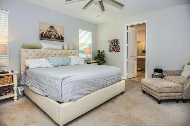 a room with cabinets and view of living room
