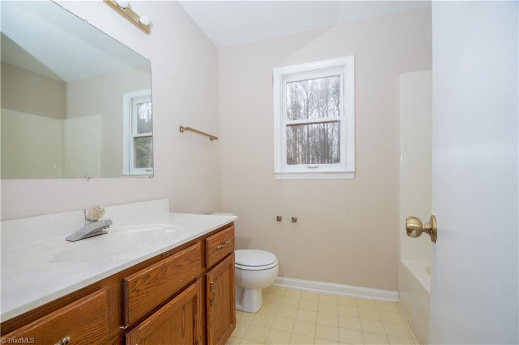 7011 Aplington Road Oak Ridge, NC 27310 - Photo 14 of 27 Upstairs Full Bath With Tub Shower Combination