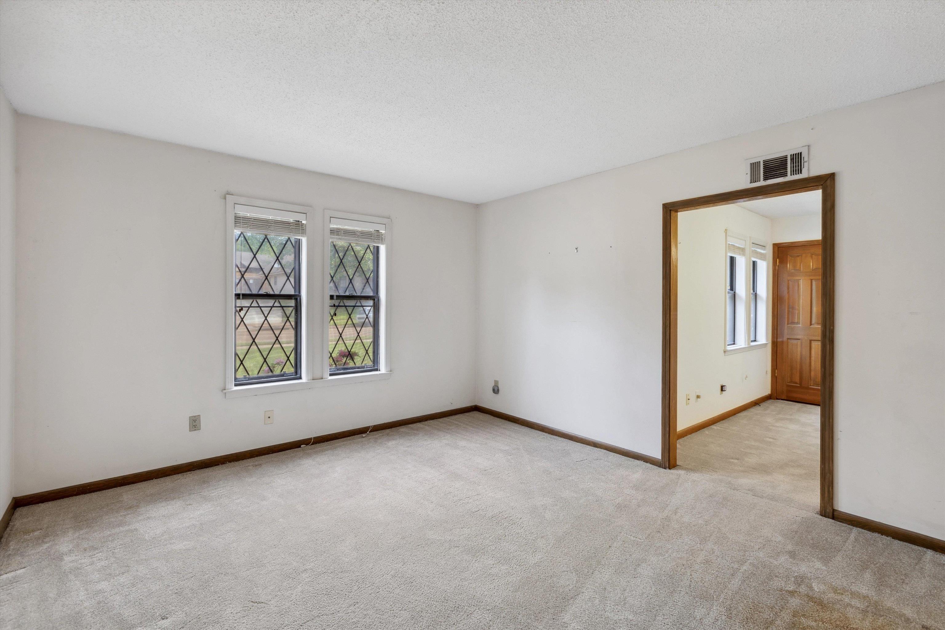 5973 Explorer Road Bartlett, TN 38134 - Photo 12 of 35 an empty room with windows and closet