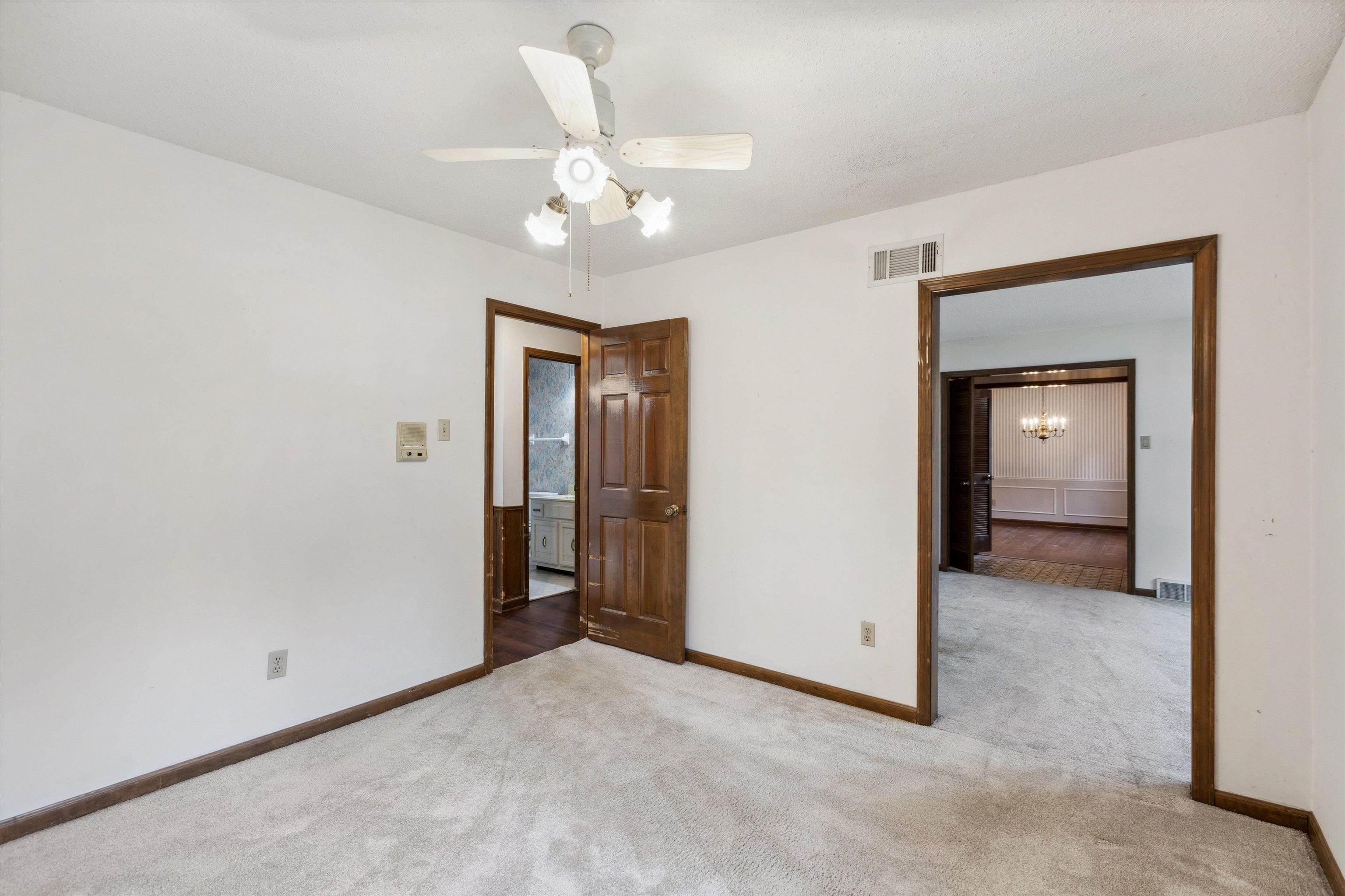 5973 Explorer Road Bartlett, TN 38134 - Photo 16 of 35 a view of an empty room with a chandelier fan