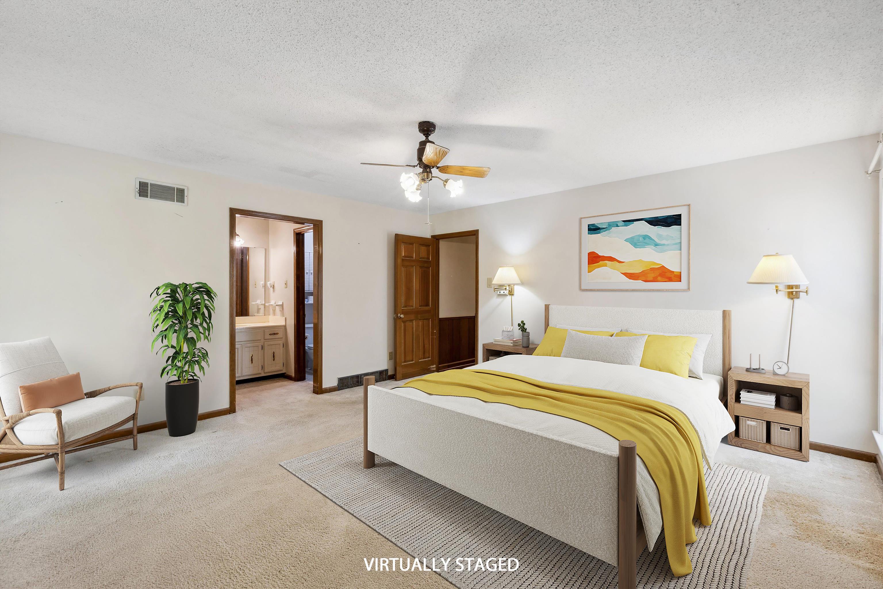 5973 Explorer Road Bartlett, TN 38134 - Photo 18 of 35 a bedroom with a bed and a chandelier