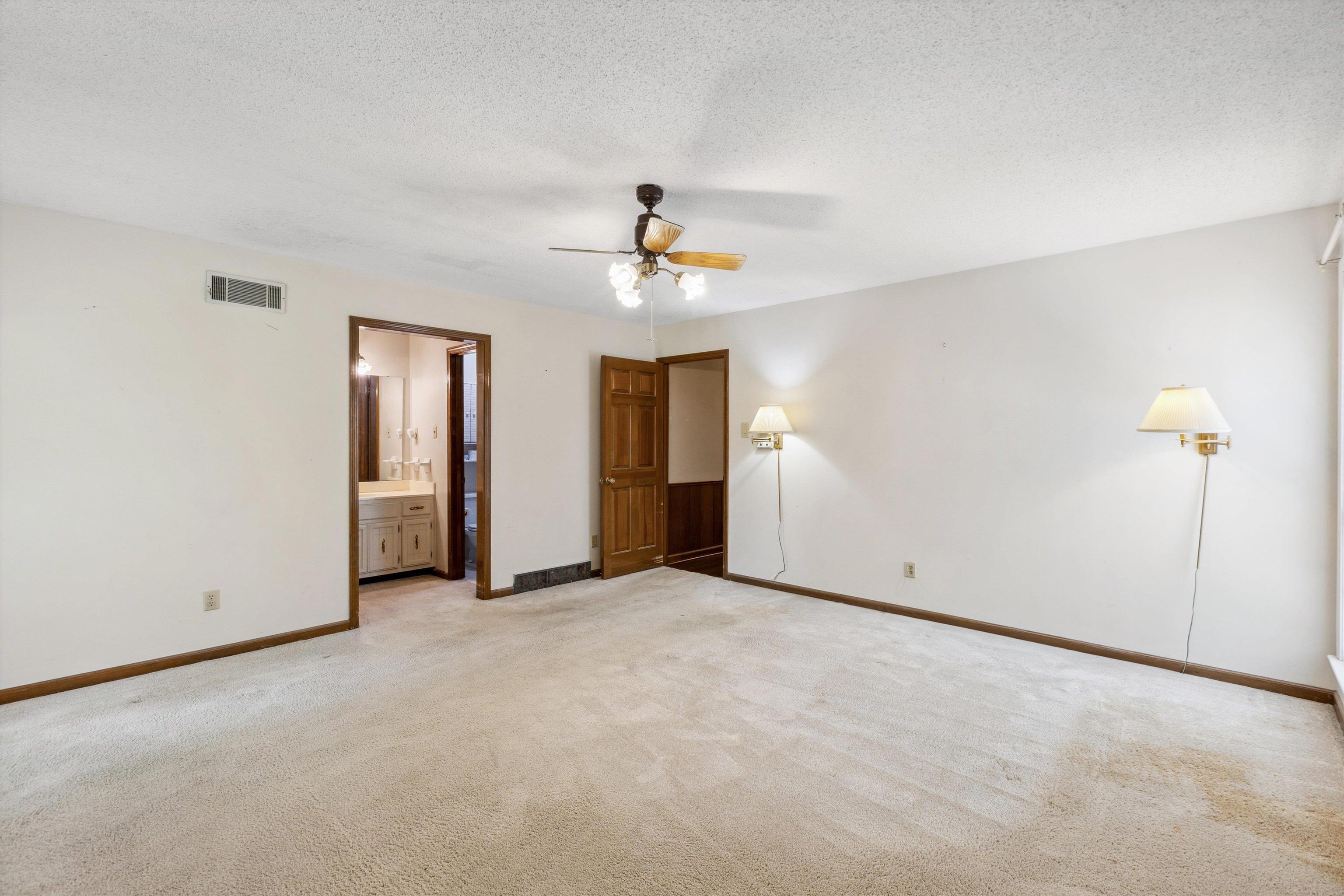 5973 Explorer Road Bartlett, TN 38134 - Photo 19 of 35 an empty room with fan and entrance