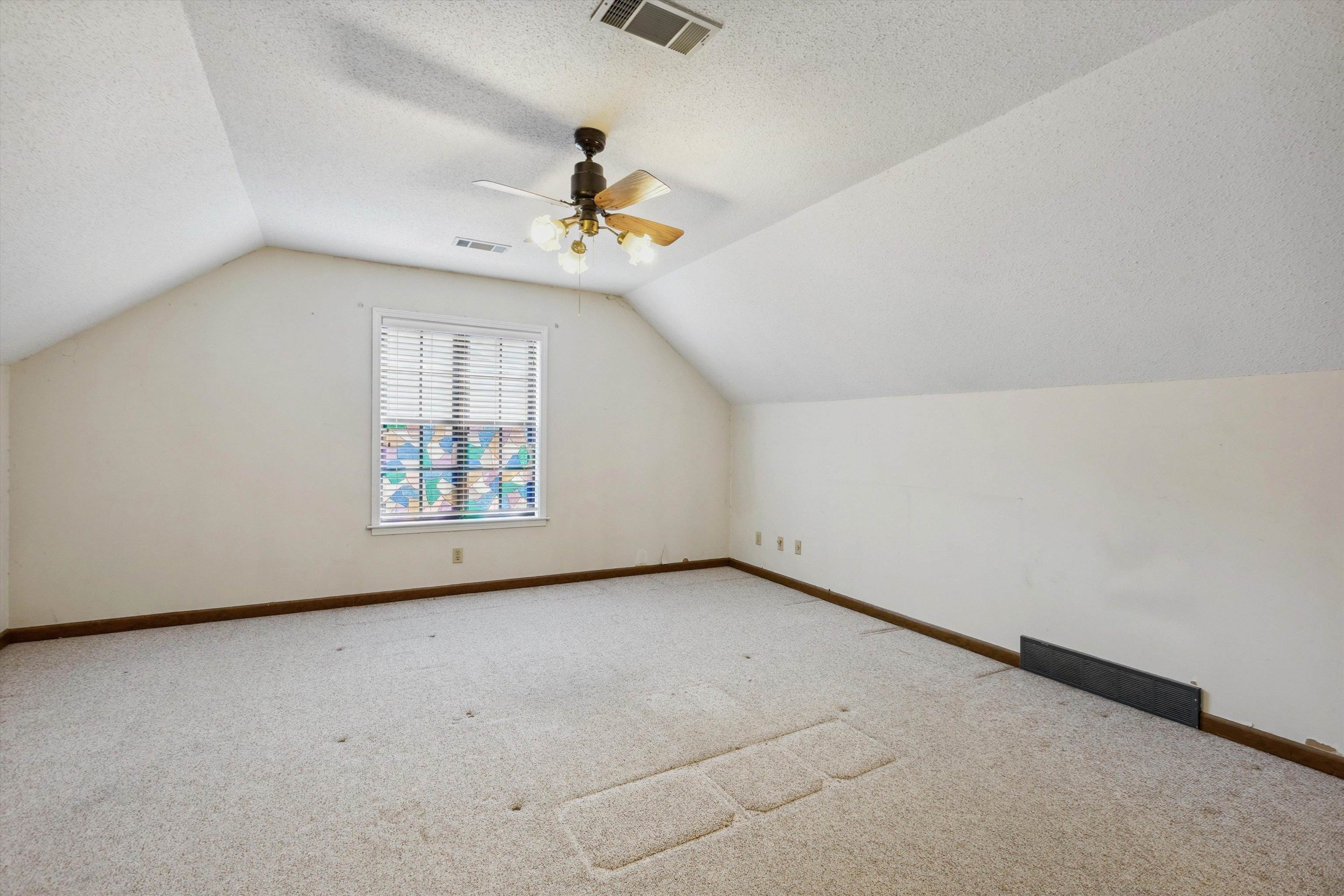 5973 Explorer Road Bartlett, TN 38134 - Photo 27 of 35 wooden floor in an empty room with a window