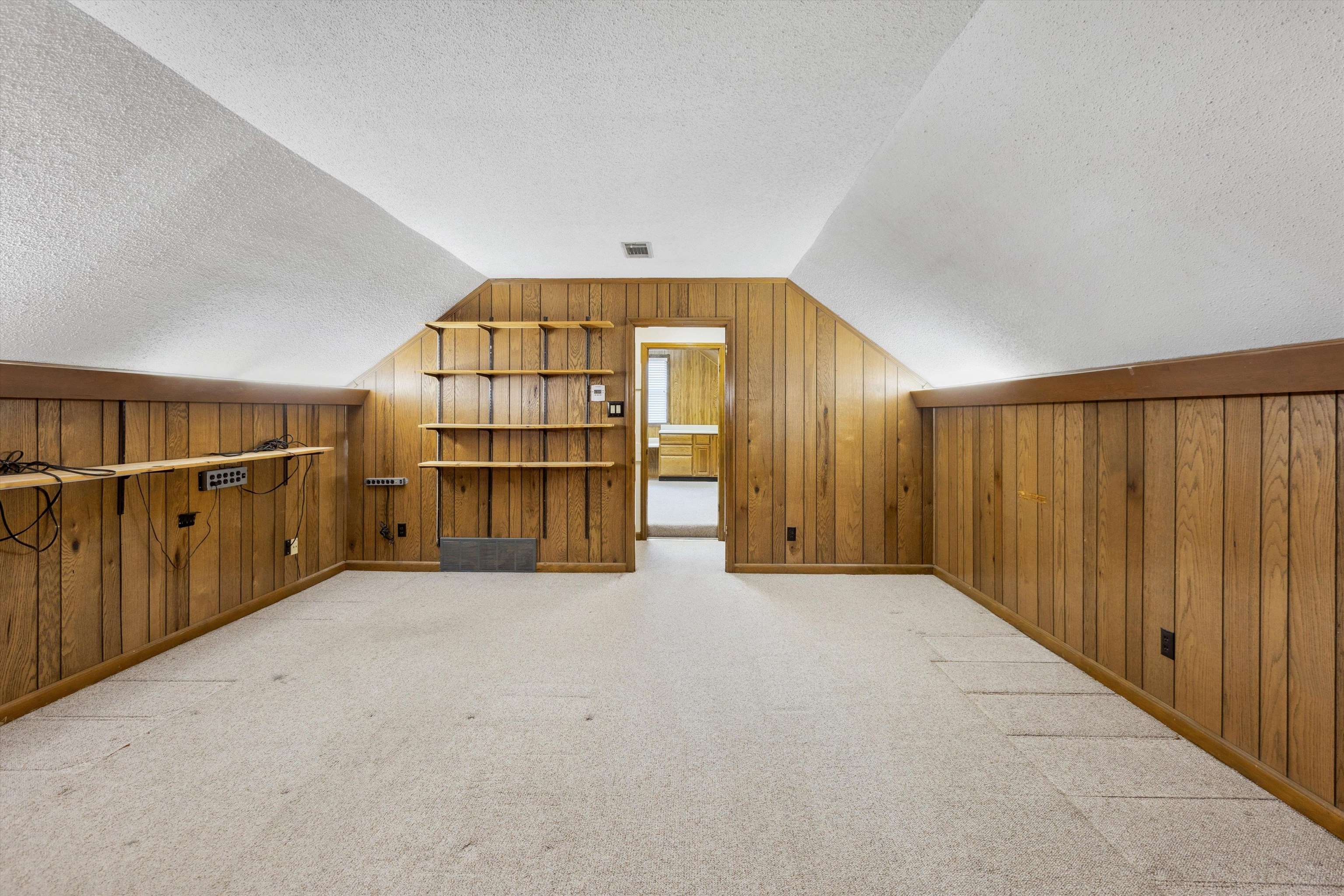 5973 Explorer Road Bartlett, TN 38134 - Photo 29 of 35 an empty room with wooden floor and windows