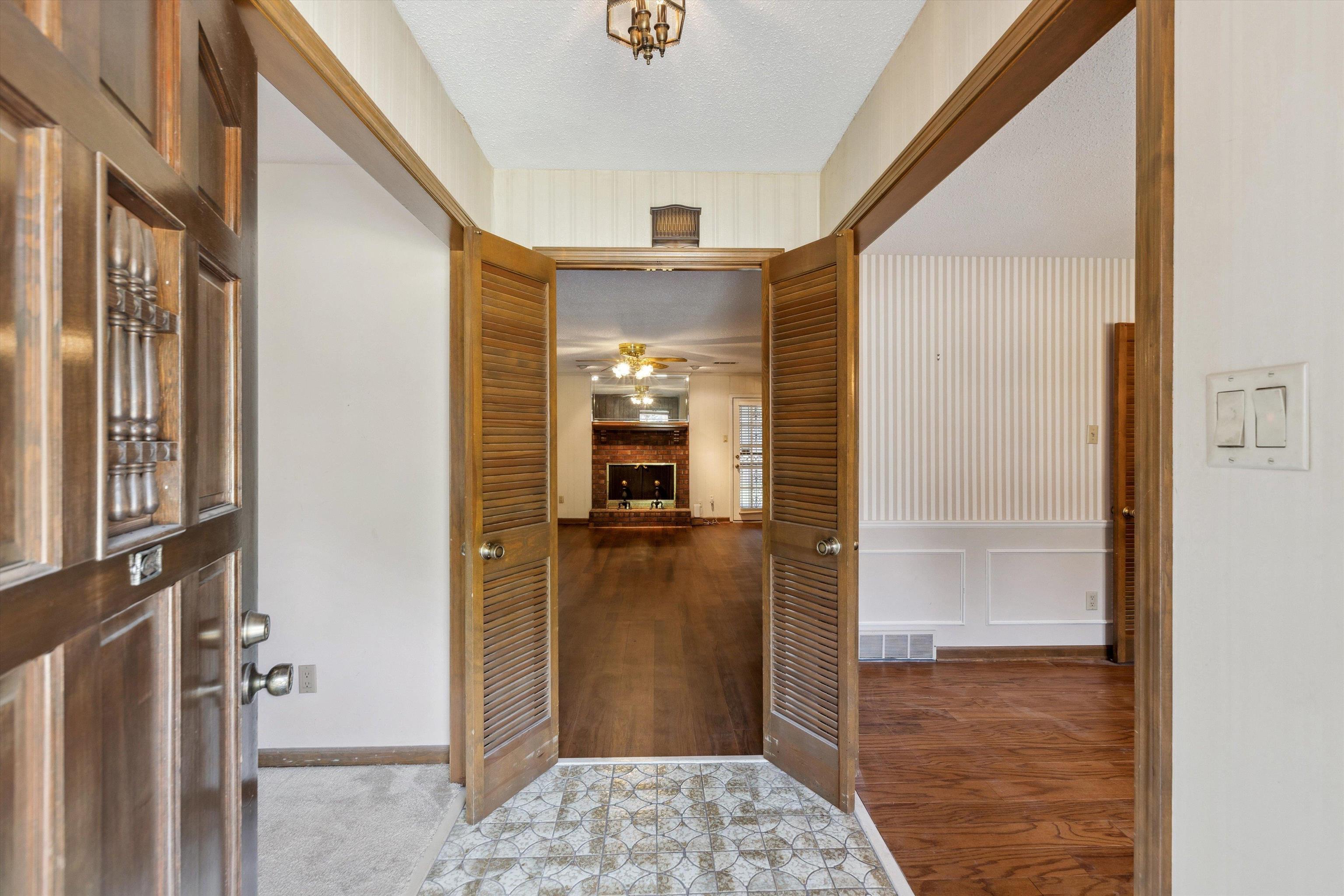 5973 Explorer Road Bartlett, TN 38134 - Photo 3 of 35 a bathroom with a shower and a mirror
