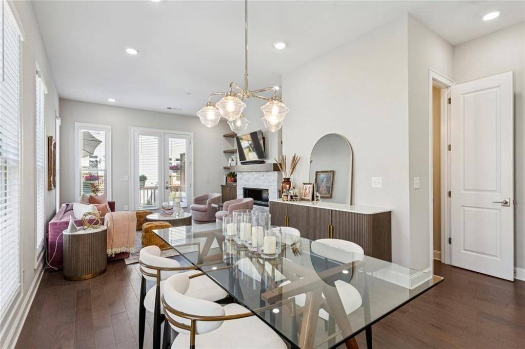 4219 Deming Circle Sandy Springs, GA 30342 - Photo 18 of 47 a view of a dining room with furniture and chandelier