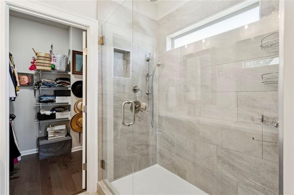 4219 Deming Circle Sandy Springs, GA 30342 - Photo 32 of 47 a bathroom with a shower