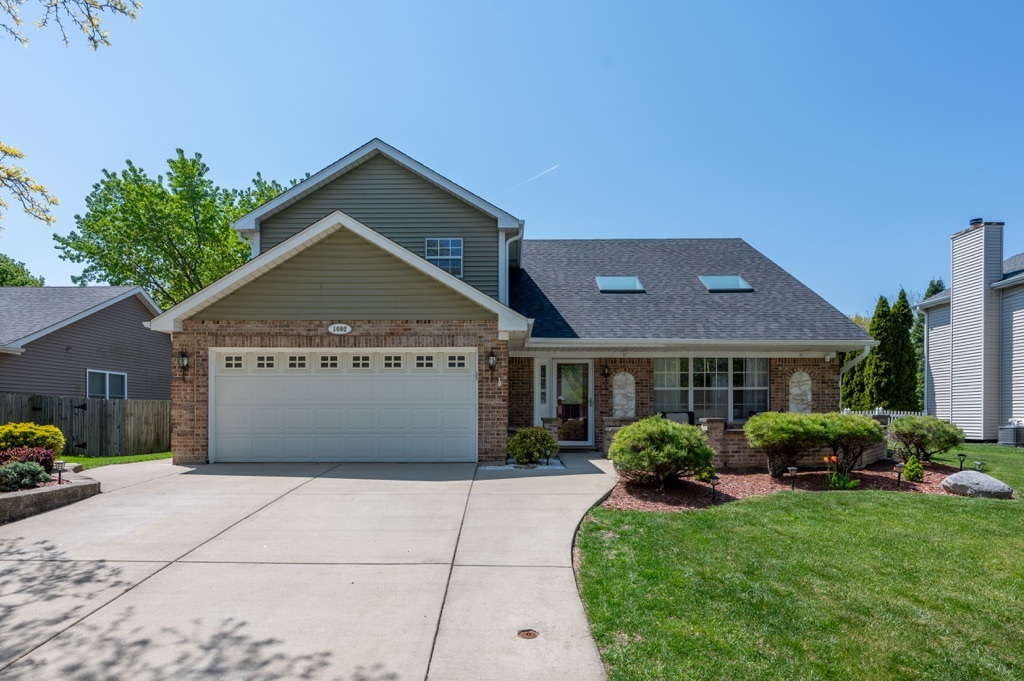 a view of a house with garden
