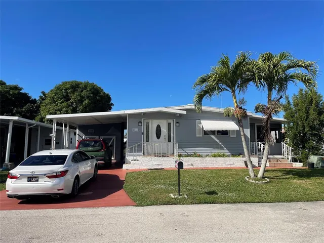 a car parked in front of a house