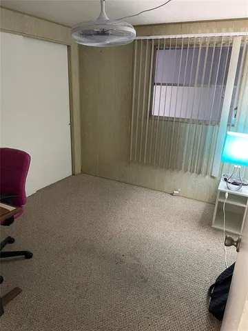 a view of livingroom with furniture and window