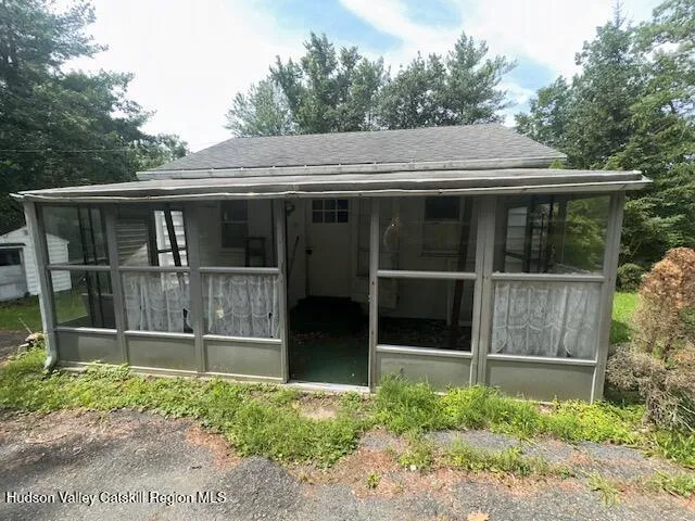 a view of backyard with green space