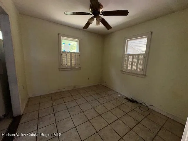 a view of an empty room and window