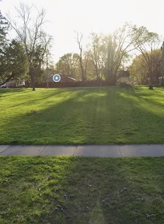 a view of outdoor space with green field