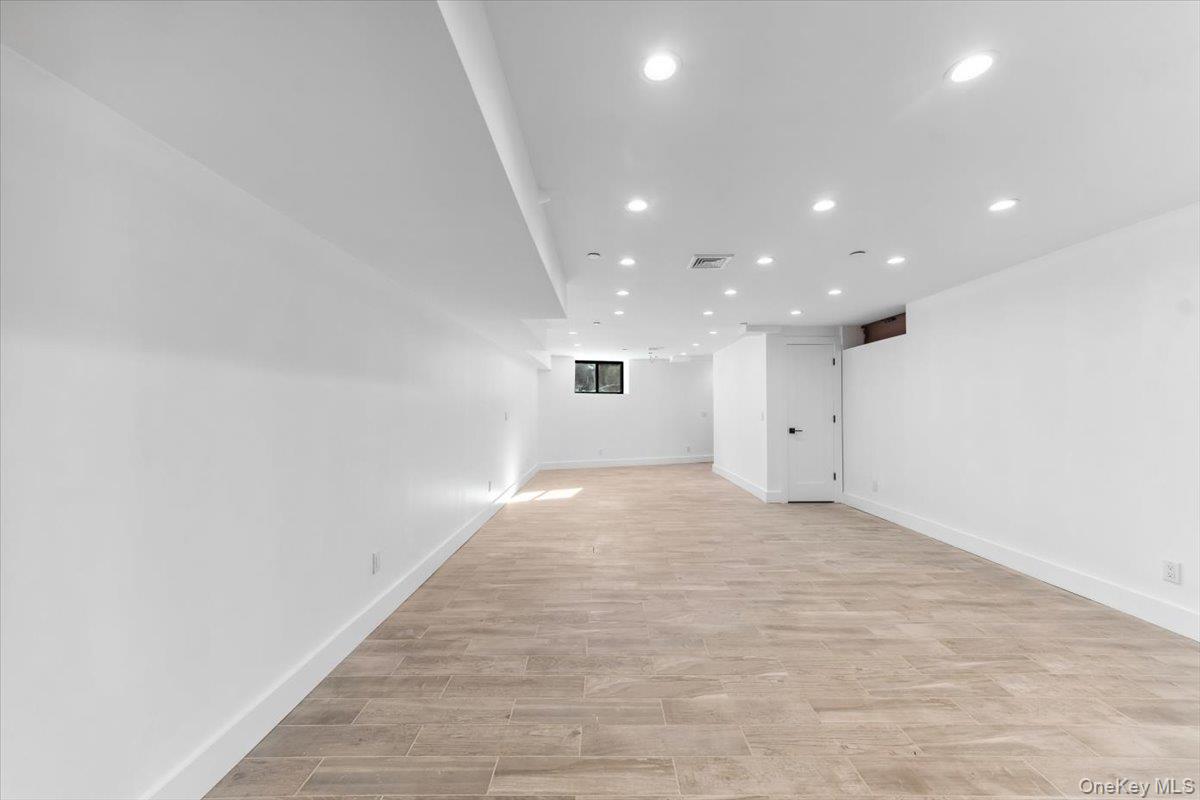 953 Tilden Street Bronx, NY 10469 - Photo 15 of 24 a view of an empty room