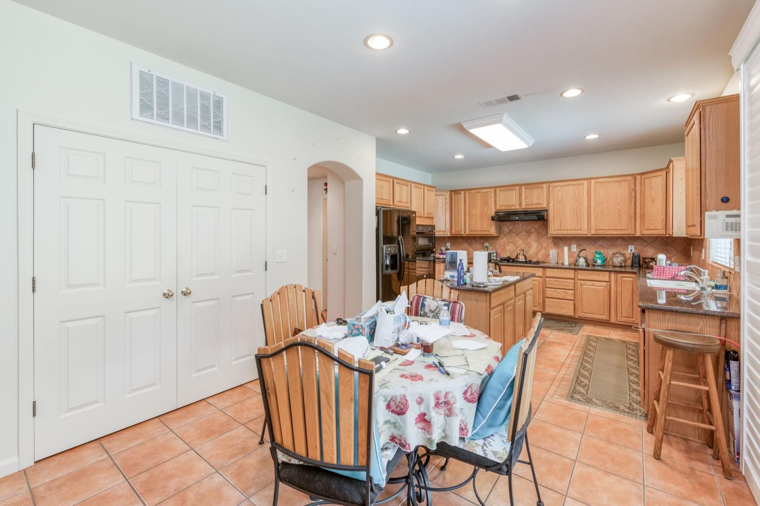 2661 Buckingham Avenue Clovis, CA 93611 - Photo 13 of 50 a view of a dining room with furniture