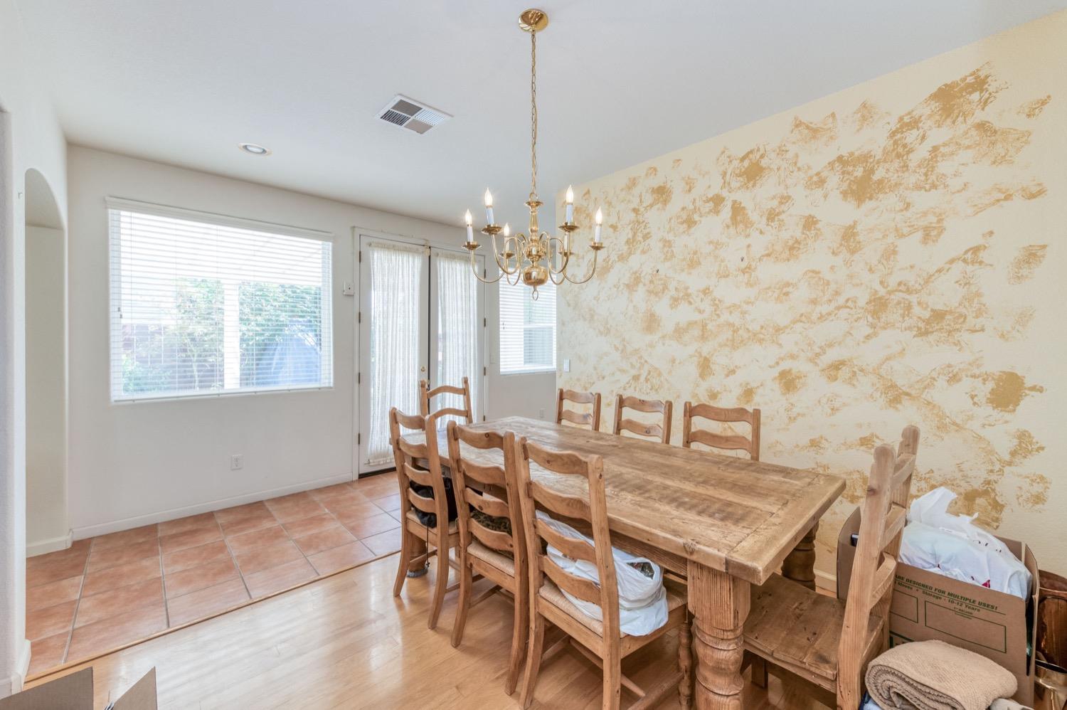 2661 Buckingham Avenue Clovis, CA 93611 - Photo 17 of 50 a view of a dining room with furniture and window