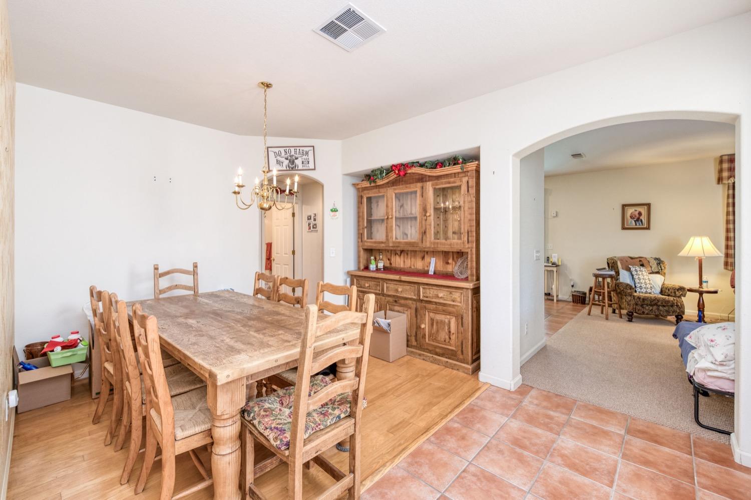 2661 Buckingham Avenue Clovis, CA 93611 - Photo 19 of 50 a view of a dining room with furniture