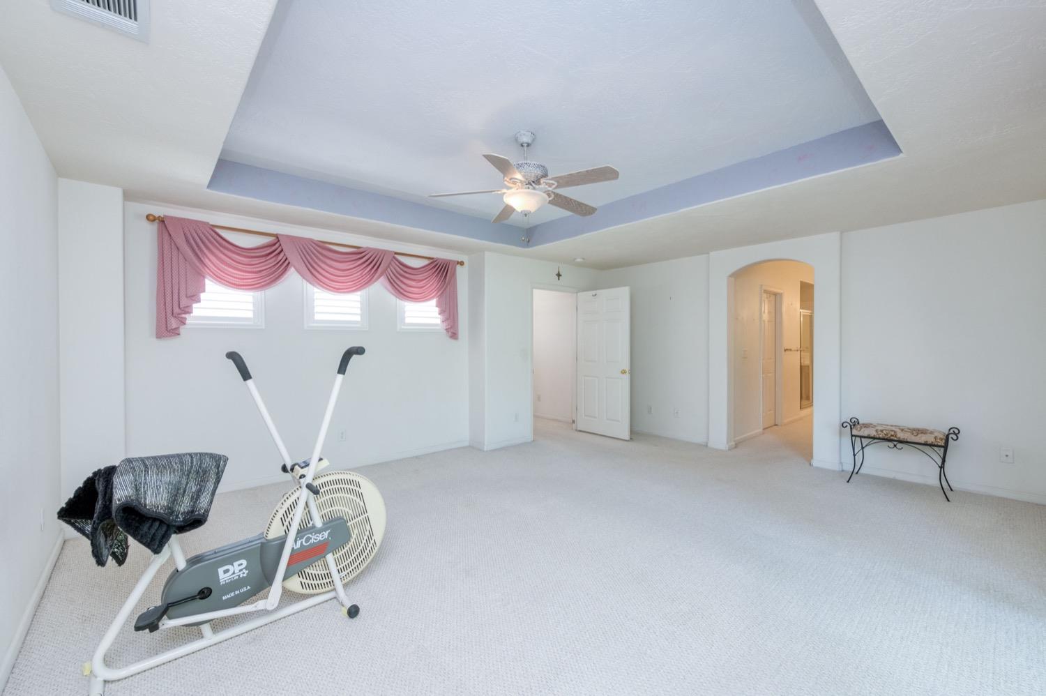 2661 Buckingham Avenue Clovis, CA 93611 - Photo 34 of 50 a view of a room with gym equipment