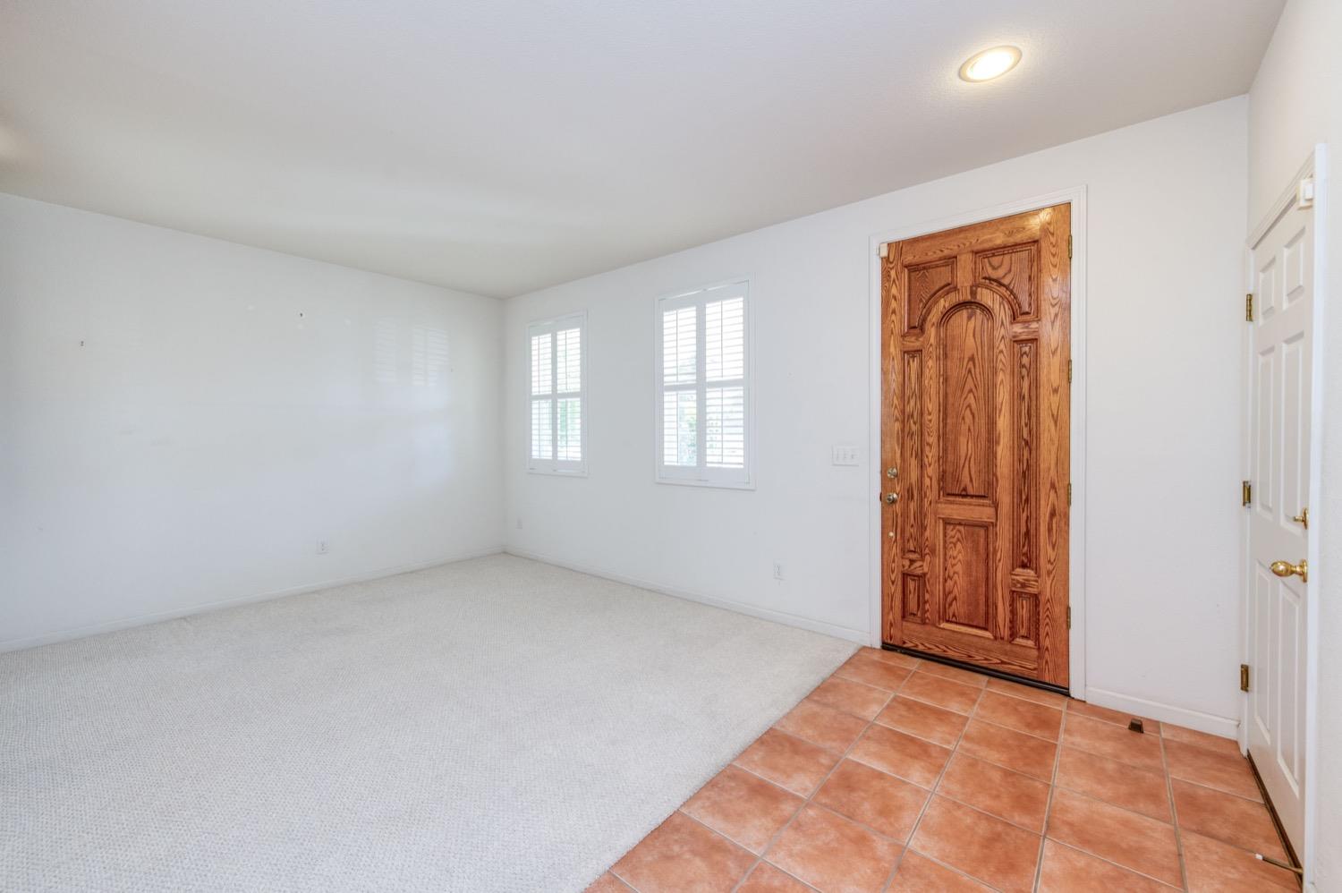 2661 Buckingham Avenue Clovis, CA 93611 - Photo 4 of 50 an empty room with windows and closet