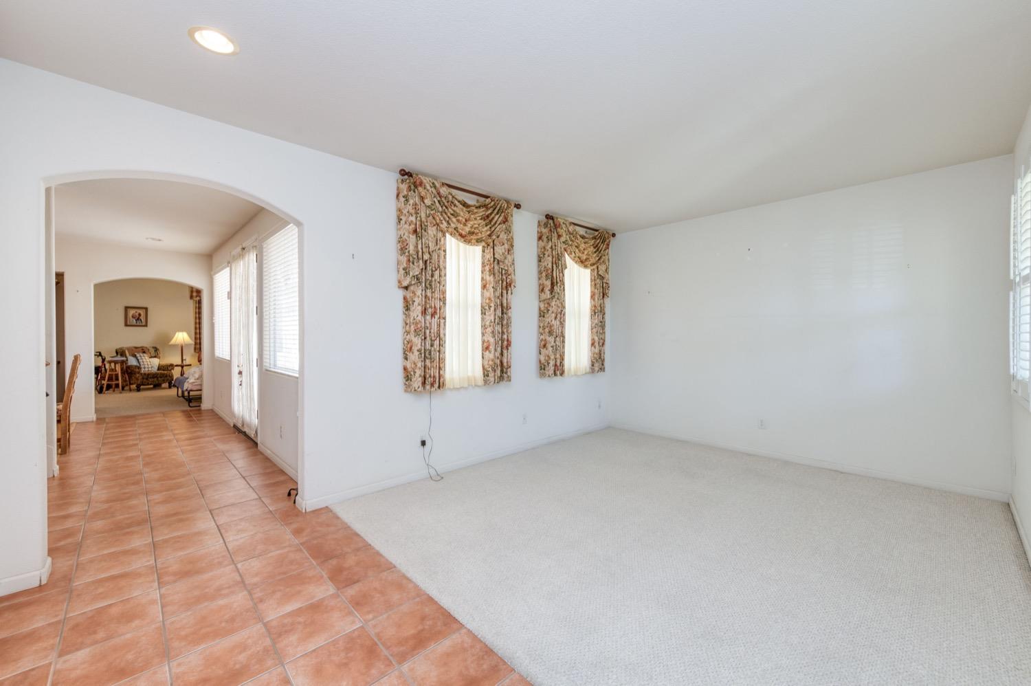 2661 Buckingham Avenue Clovis, CA 93611 - Photo 7 of 50 a view of a room with window and mirror