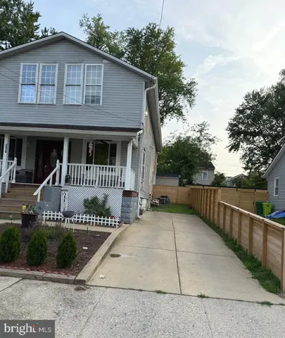 a front view of a house with garage