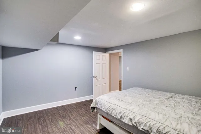 a white refrigerator freezer and a stove in a kitchen