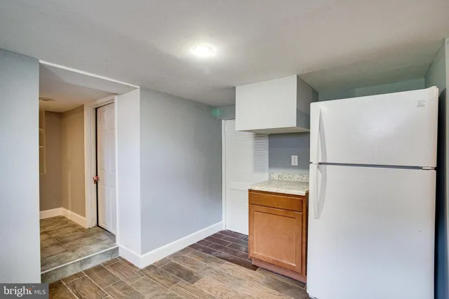 a kitchen with stainless steel appliances granite countertop a stove and a sink
