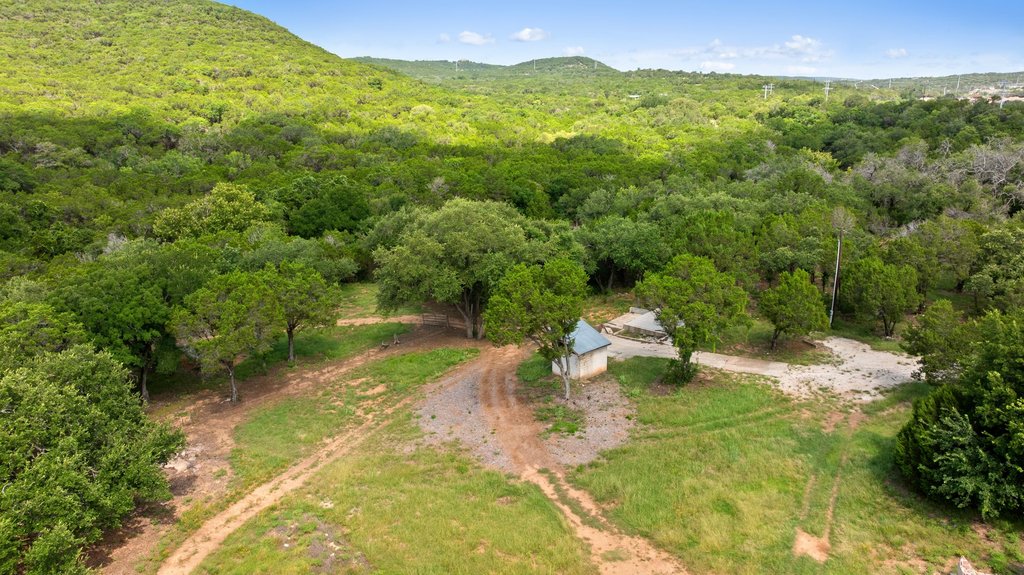 23644 Nameless Road Leander, TX 78641 - Photo 38 of 40 A tranquil rural lot featuring lush greenery and scenic hill country vistas.