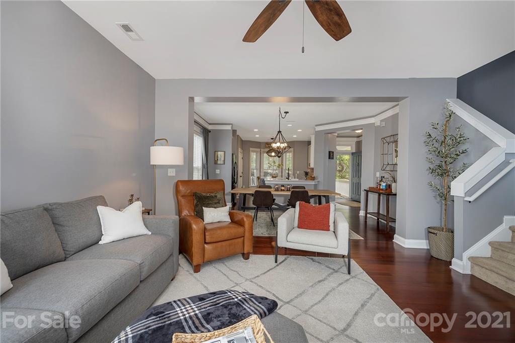13524 Stumptown Road Huntersville, NC 28078 - Photo 17 of 26 a living room with furniture and wooden floor