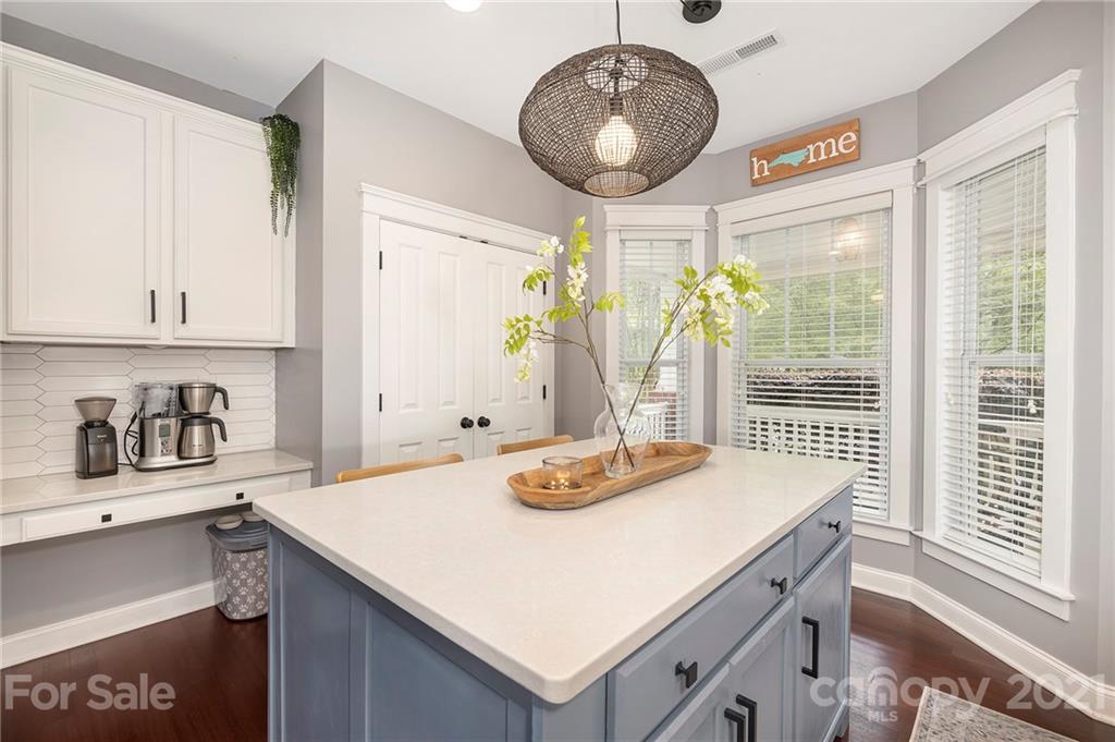 13524 Stumptown Road Huntersville, NC 28078 - Photo 3 of 26 a kitchen with a table chairs and a window