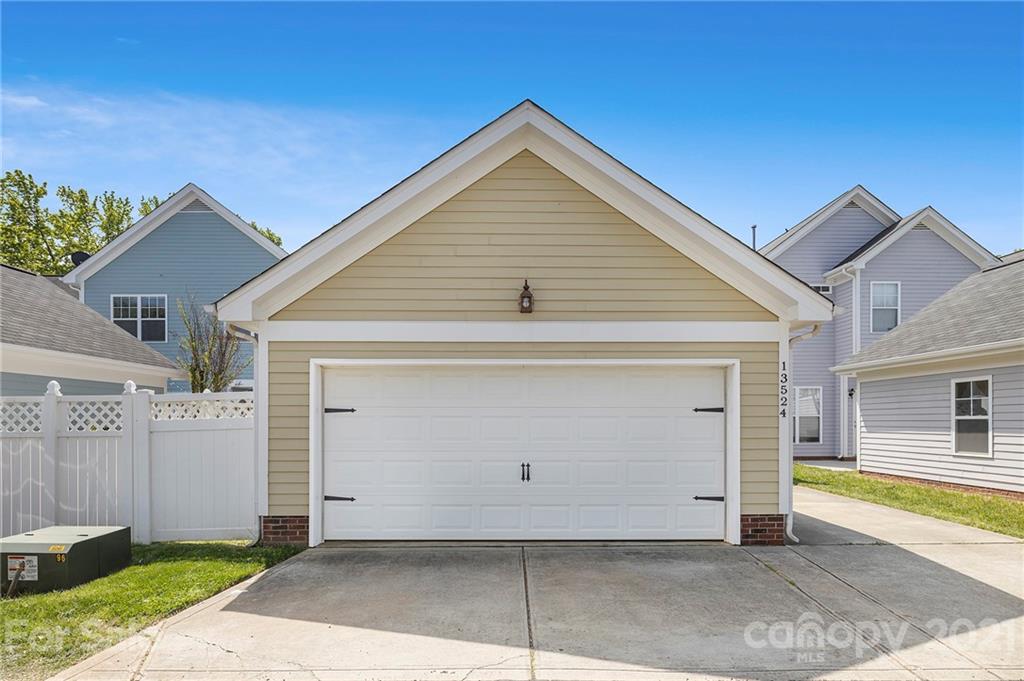 13524 Stumptown Road Huntersville, NC 28078 - Photo 23 of 26 a view of a house with a garage