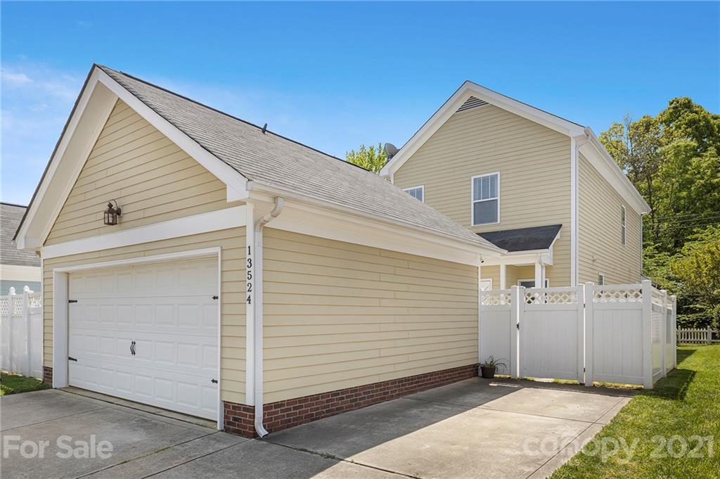 13524 Stumptown Road Huntersville, NC 28078 - Photo 24 of 26 a view of a house with a garage