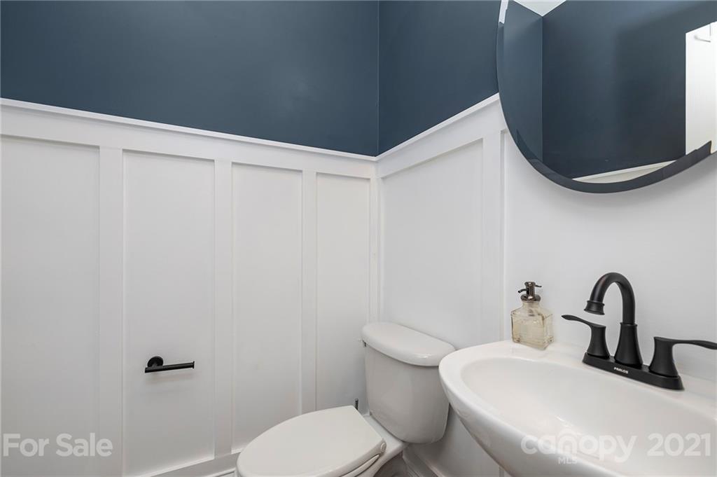 13524 Stumptown Road Huntersville, NC 28078 - Photo 9 of 26 a bathroom with a toilet and sink