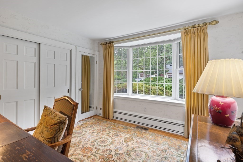 32 Hidden Road Andover, MA 01810 - Photo 25 of 34 a living room with furniture and a window