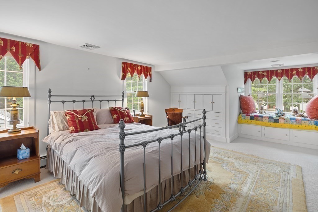 32 Hidden Road Andover, MA 01810 - Photo 32 of 34 a bed room with two beds and a large window