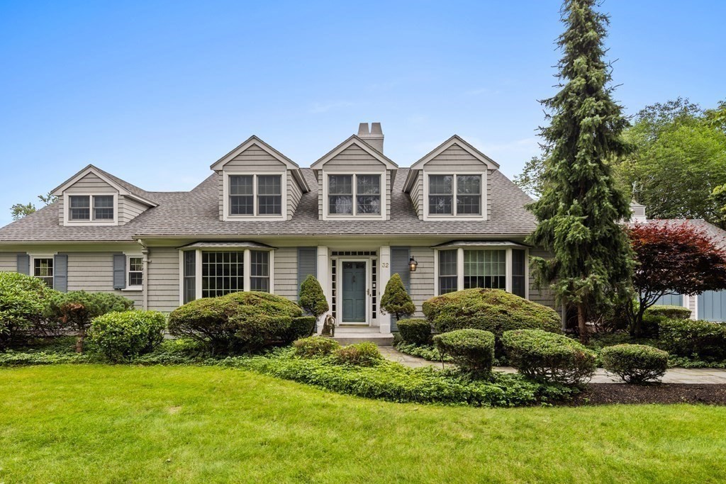 32 Hidden Road Andover, MA 01810 - Photo 5 of 34 a front view of a house with a yard