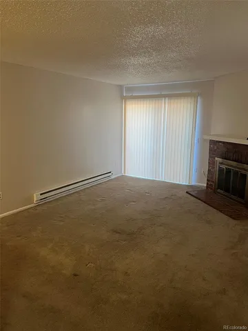 a bathroom with a toilet a sink and shower