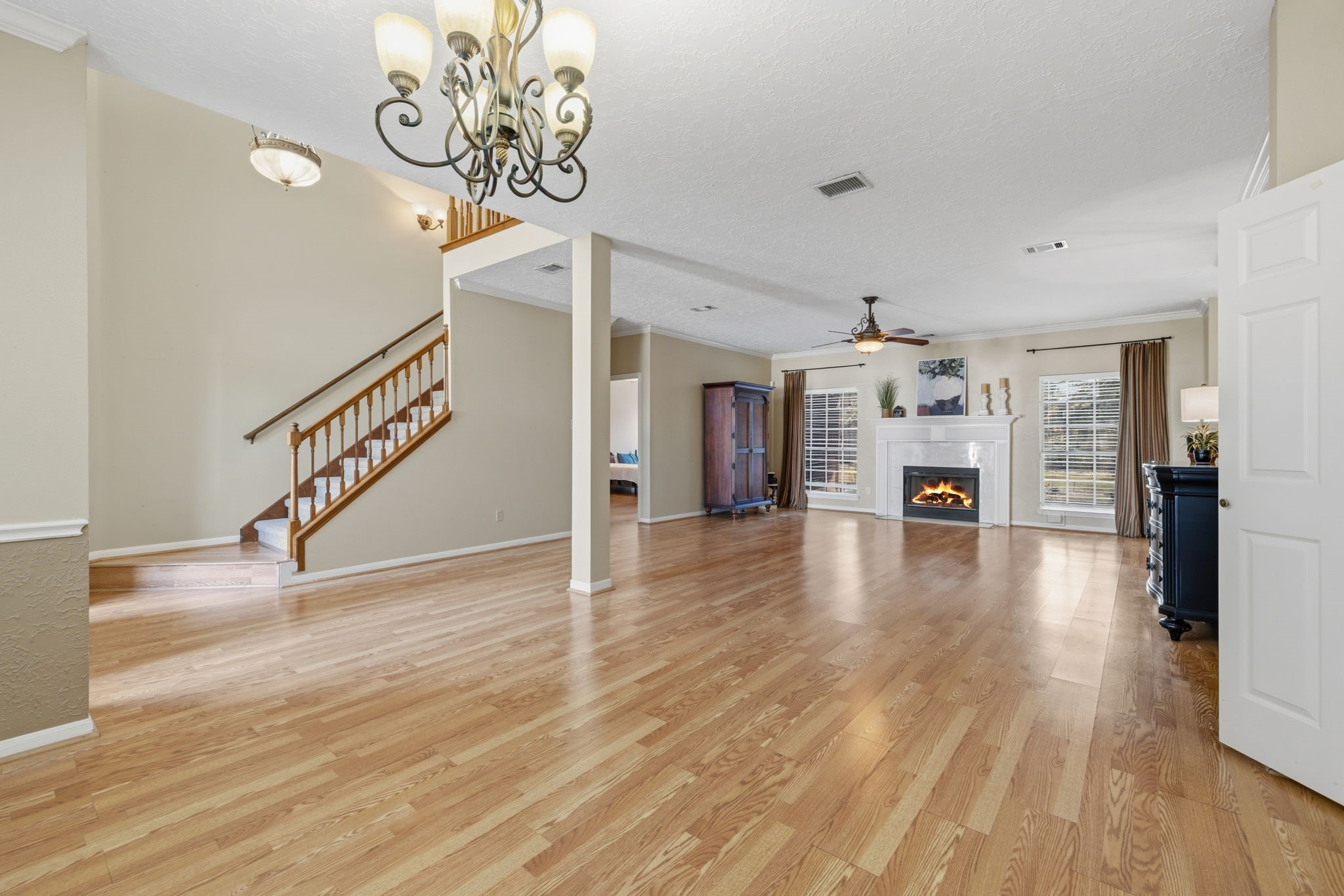 8403 Northbridge Drive Spring, TX 77379 - Photo 11 of 50 a view of an empty room with wooden floor