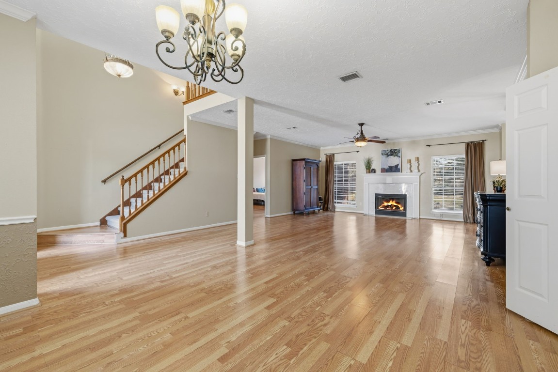 8403 Northbridge Drive Spring, TX 77379 - Photo 11 of 50 a view of an empty room with wooden floor