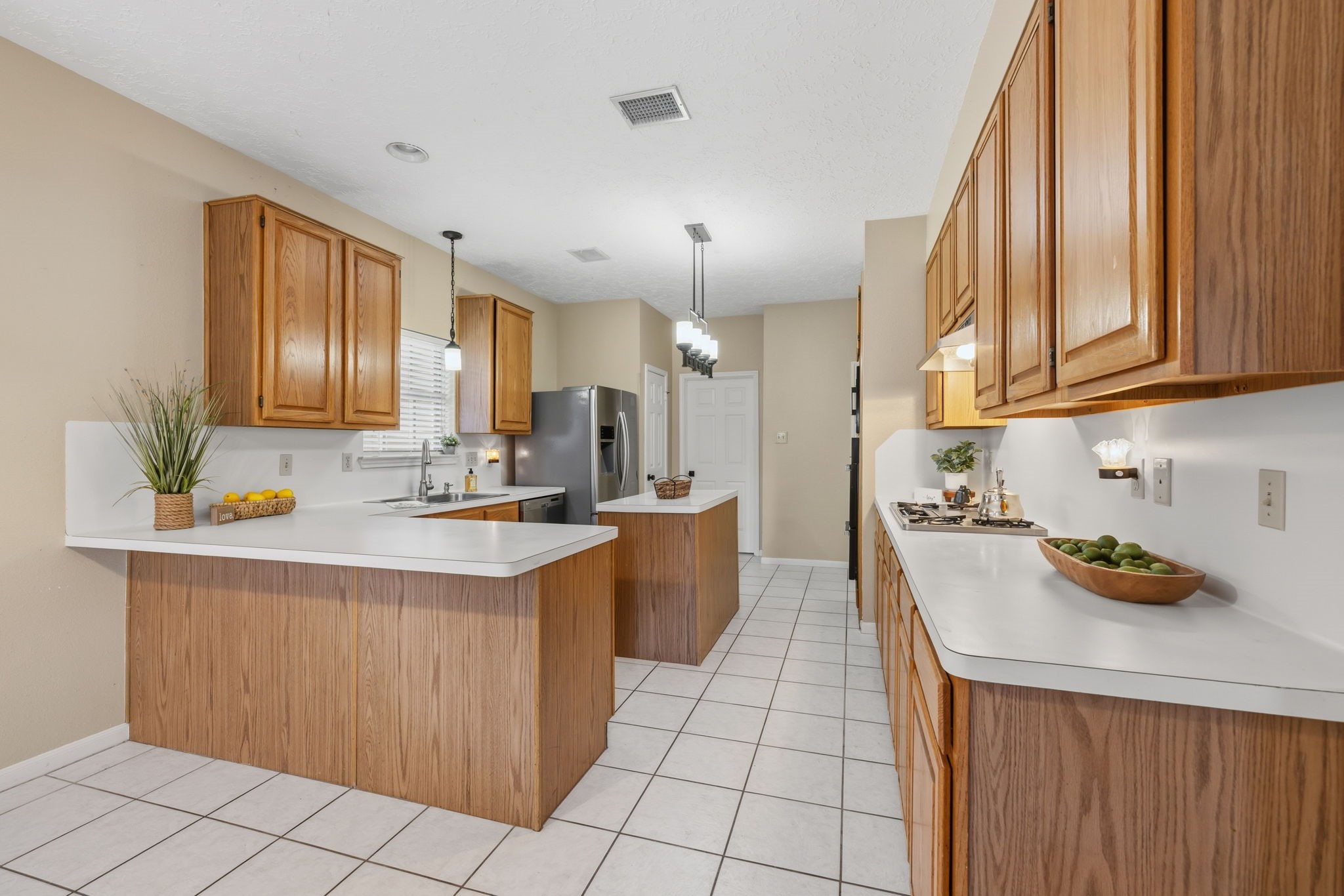 8403 Northbridge Drive Spring, TX 77379 - Photo 13 of 50 a kitchen with a sink cabinets and window