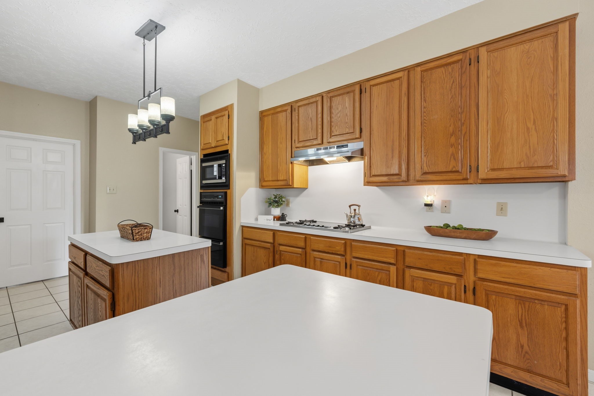 8403 Northbridge Drive Spring, TX 77379 - Photo 16 of 50 a kitchen with stainless steel appliances a sink stove and refrigerator