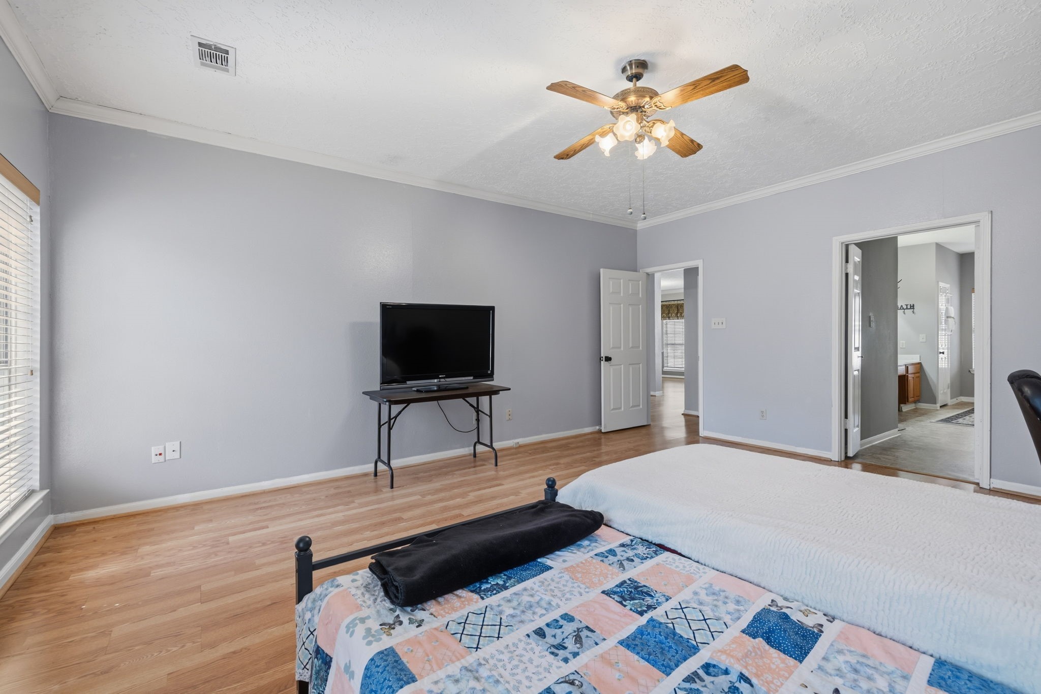 8403 Northbridge Drive Spring, TX 77379 - Photo 21 of 50 a bedroom with a bed and a flat screen tv