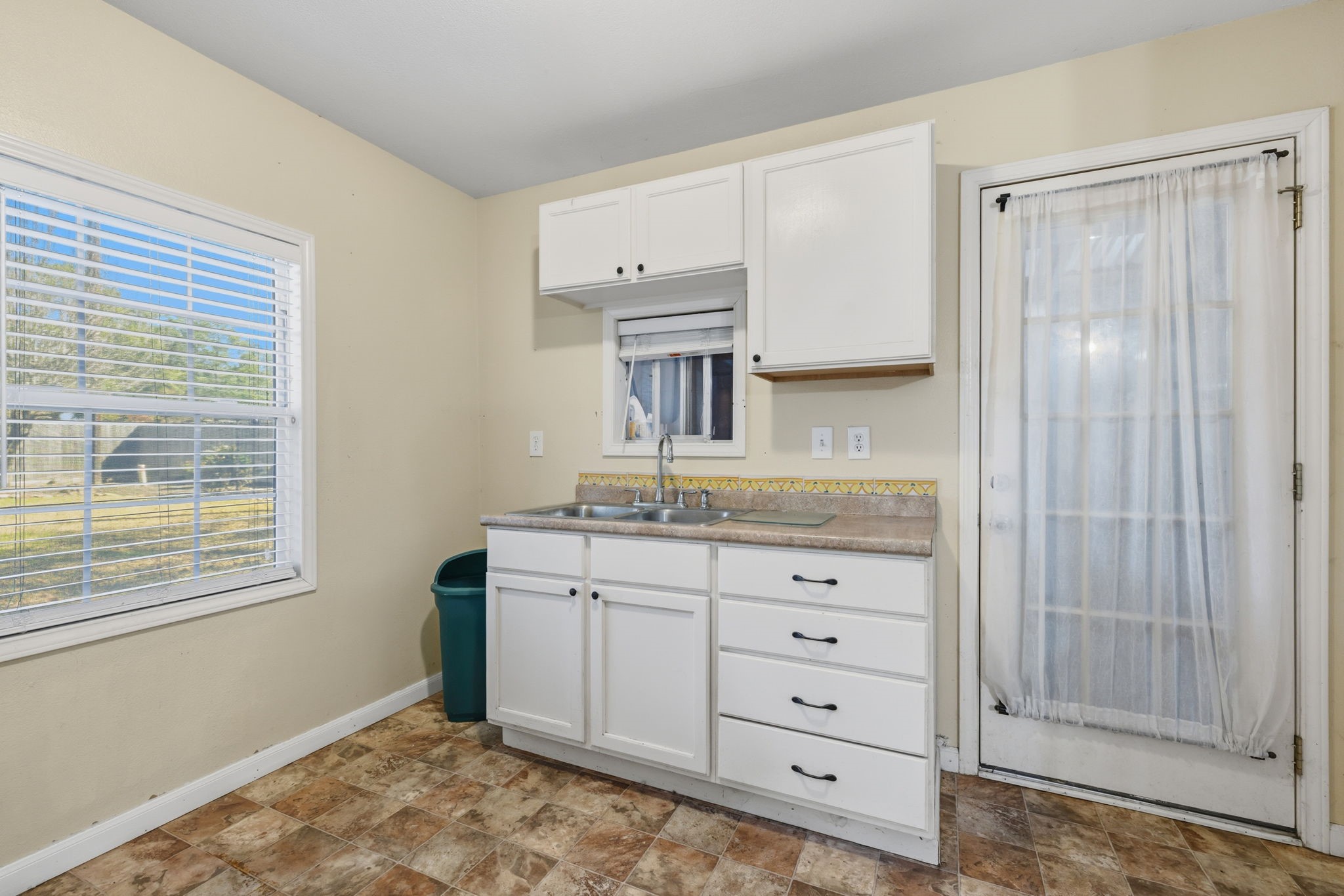 8403 Northbridge Drive Spring, TX 77379 - Photo 36 of 50 a bathroom with a granite countertop sink a mirror and a shower