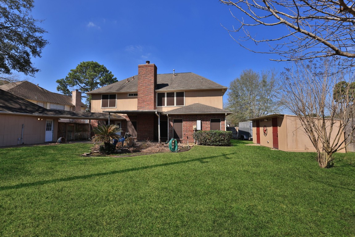 8403 Northbridge Drive Spring, TX 77379 - Photo 40 of 50 a view of a house with a yard