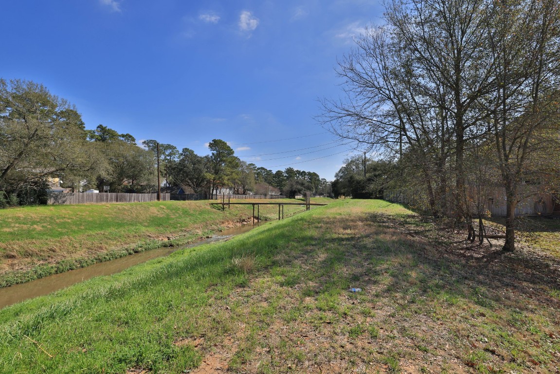 8403 Northbridge Drive Spring, TX 77379 - Photo 5 of 50 a view of outdoor space with garden and trees