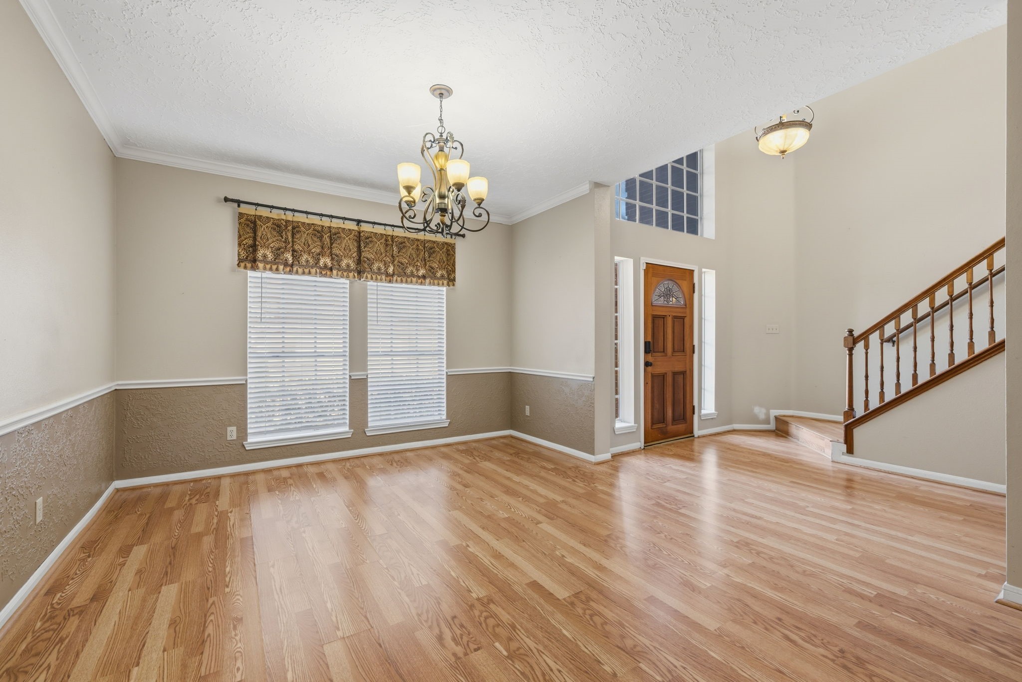 8403 Northbridge Drive Spring, TX 77379 - Photo 9 of 50 wooden floor in an empty room with a window