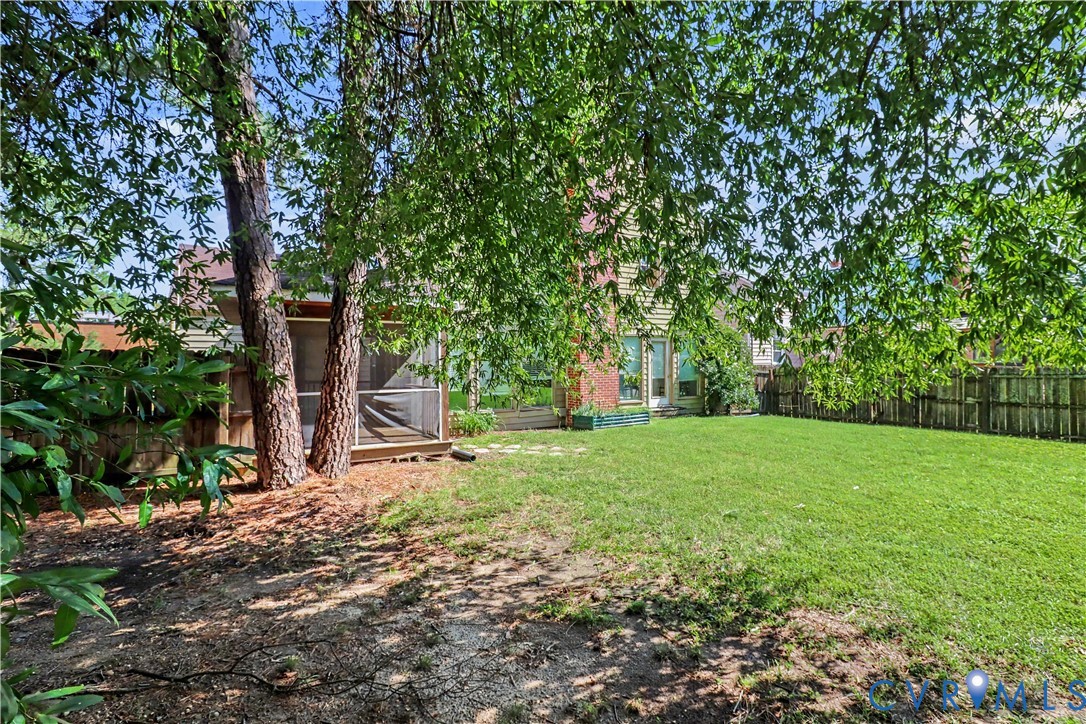 4803 Coleman Road Richmond, VA 23230 - Photo 44 of 54 Expansive rear lawn, screened porch with wood deck