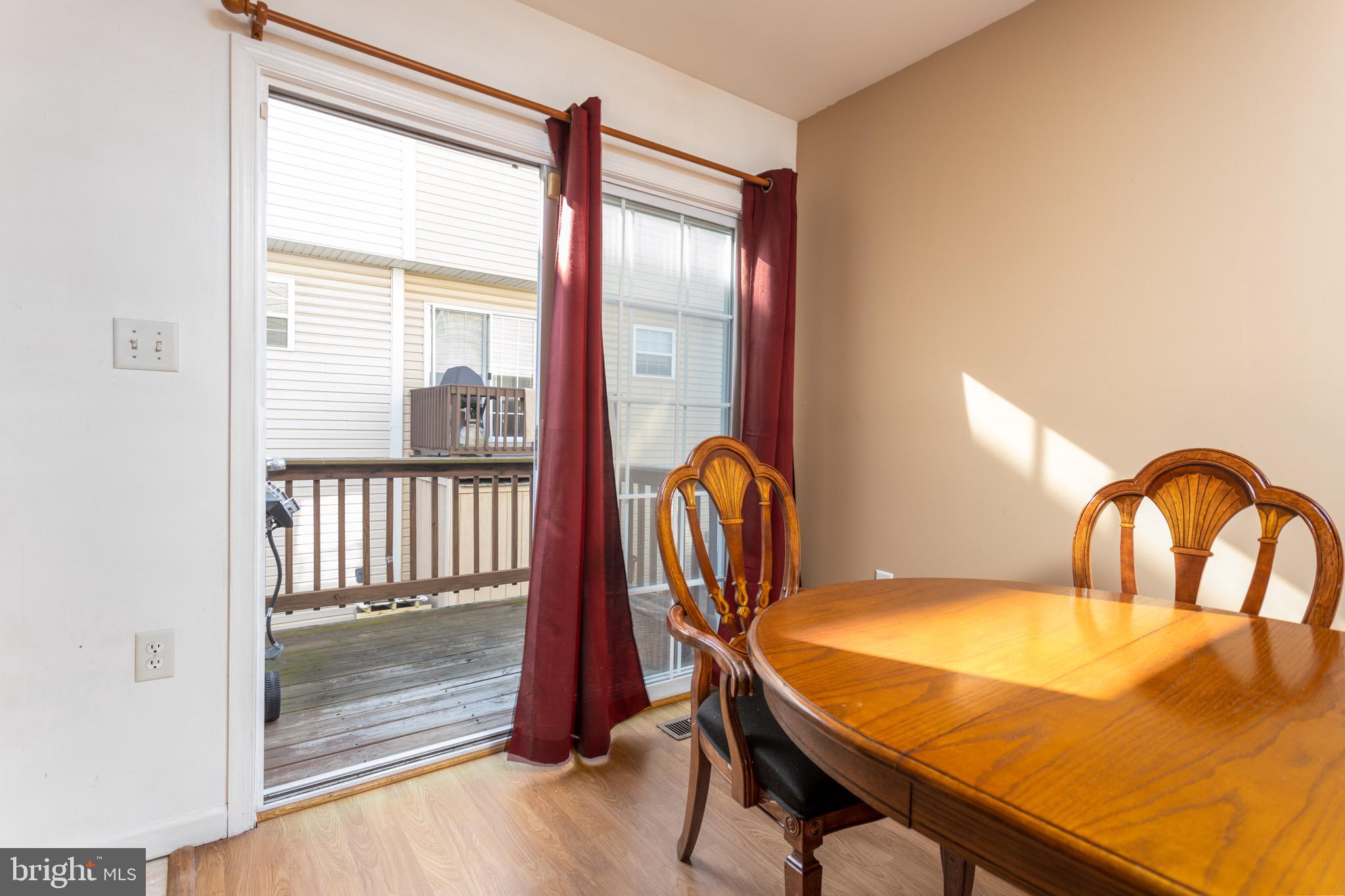 123 North Marshall Street Ranson, WV 25438 - Photo 14 of 28 Dining room with access to deck